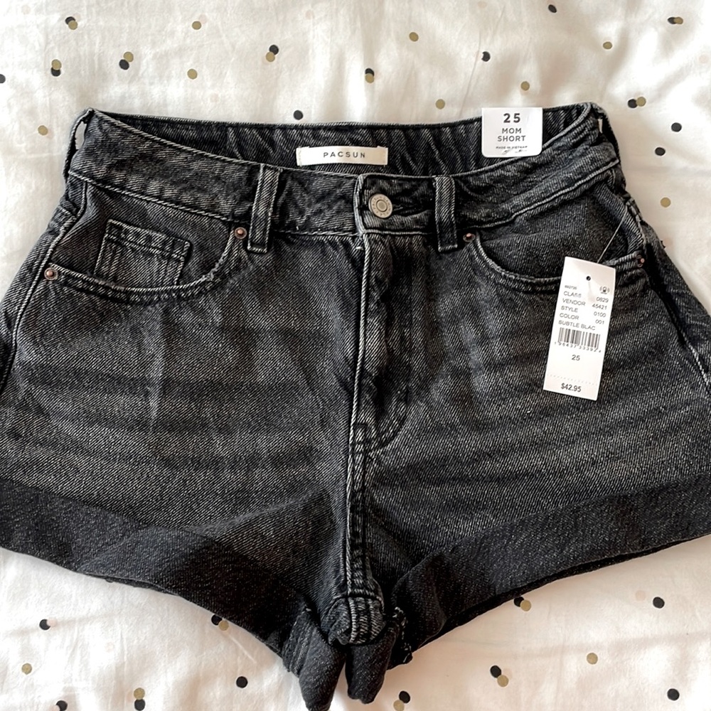 Got these last summer and never wore them. Size 25. Mom short. Subtle black.